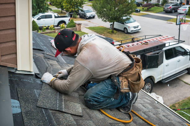 Professional Gutter Repair And Installation technician working in Dumont, NJ
